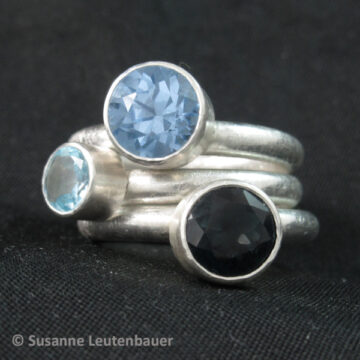 Drei Ringe mit synthetischen Spinell, Sky Blue Topas, London Blue Topas