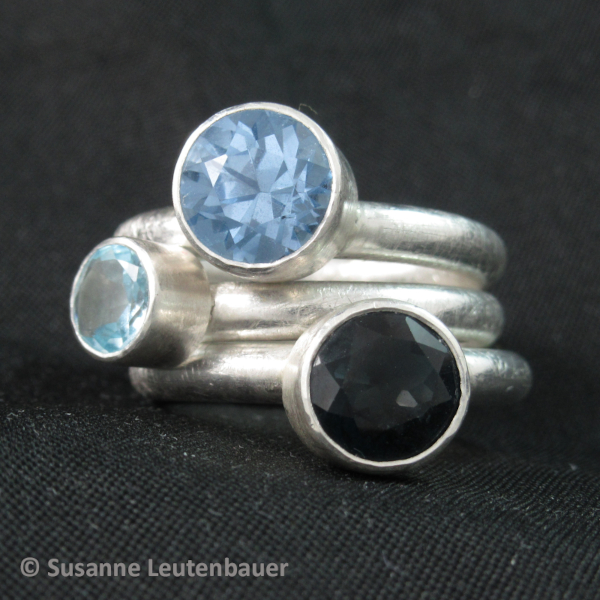 Drei Ringe mit synthetischen Spinell, Sky Blue Topas, London Blue Topas